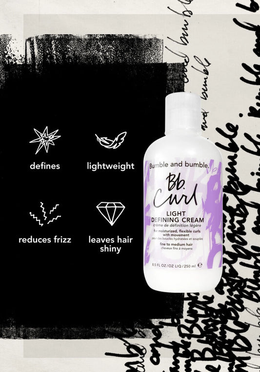 A bottle of Bumble and Bumble Blunt Curl Light Defining Cream is shown against a stylized black and white background with graphic text and icons highlighting product benefits: defines, lightweight, reduces frizz, and leaves hair shiny.