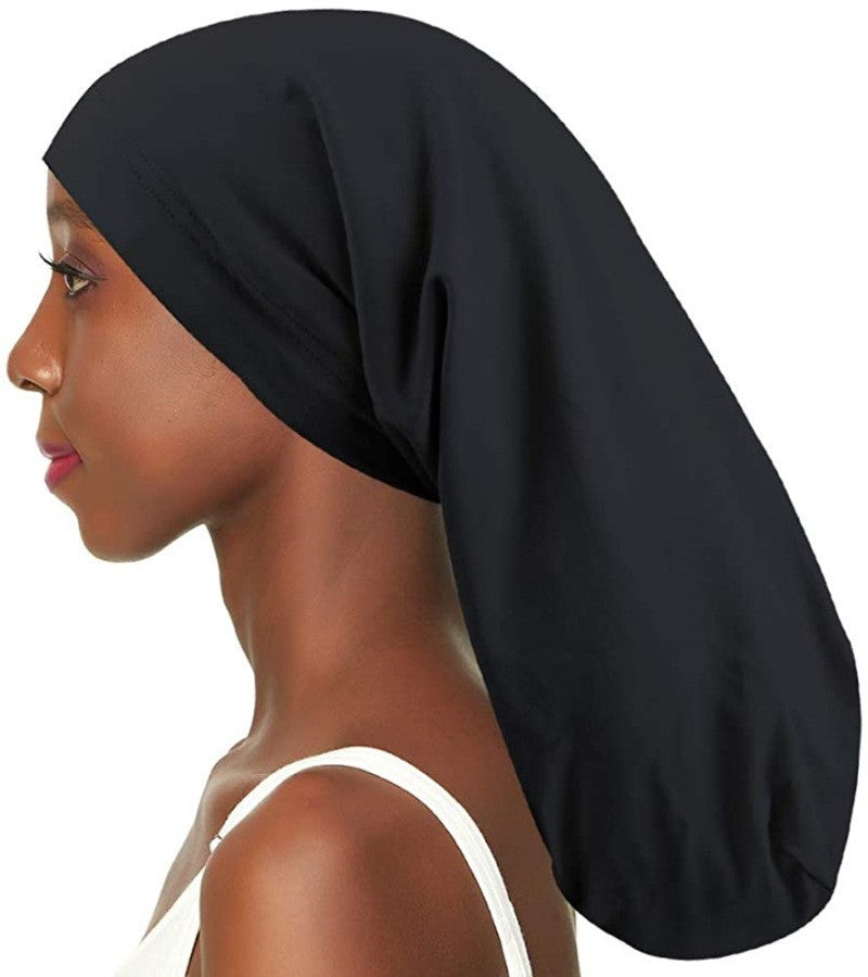Satin lined long nightcap protecting braids and long hair
Adjustable sleep cap for dreadlocks and thick hairstyles
Woman wearing satin bonnet for frizz-free overnight hair
Long hair nightcap with secure comfortable fit