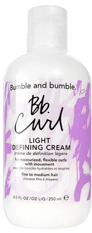 A white bottle of Bb. Curl Light Defining Cream with purple and black text and graphics on the label, shown against a plain white background.